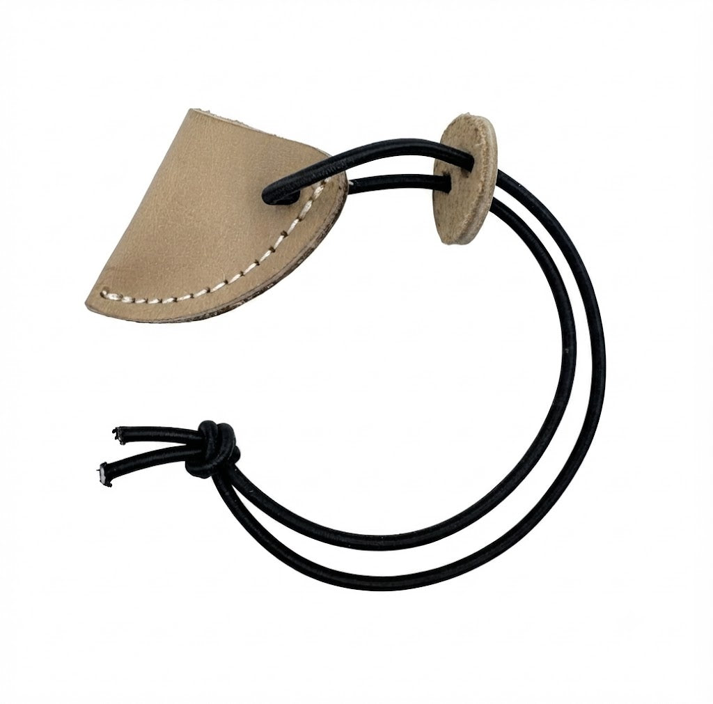 Bearpaw Leather Tip String Keeper